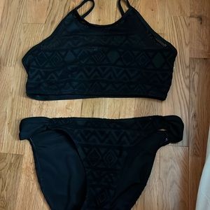 Used in good condition worn twice bathing suit in size small